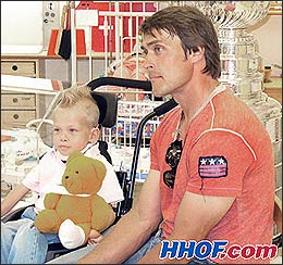 Teemu Selanne visits with young patients at the Helsinki Children's Hospital