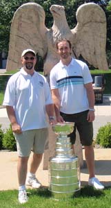 Stanley Cup Cup Keeper Walt Neubrand and Penguins defenseman Brooks Orpik