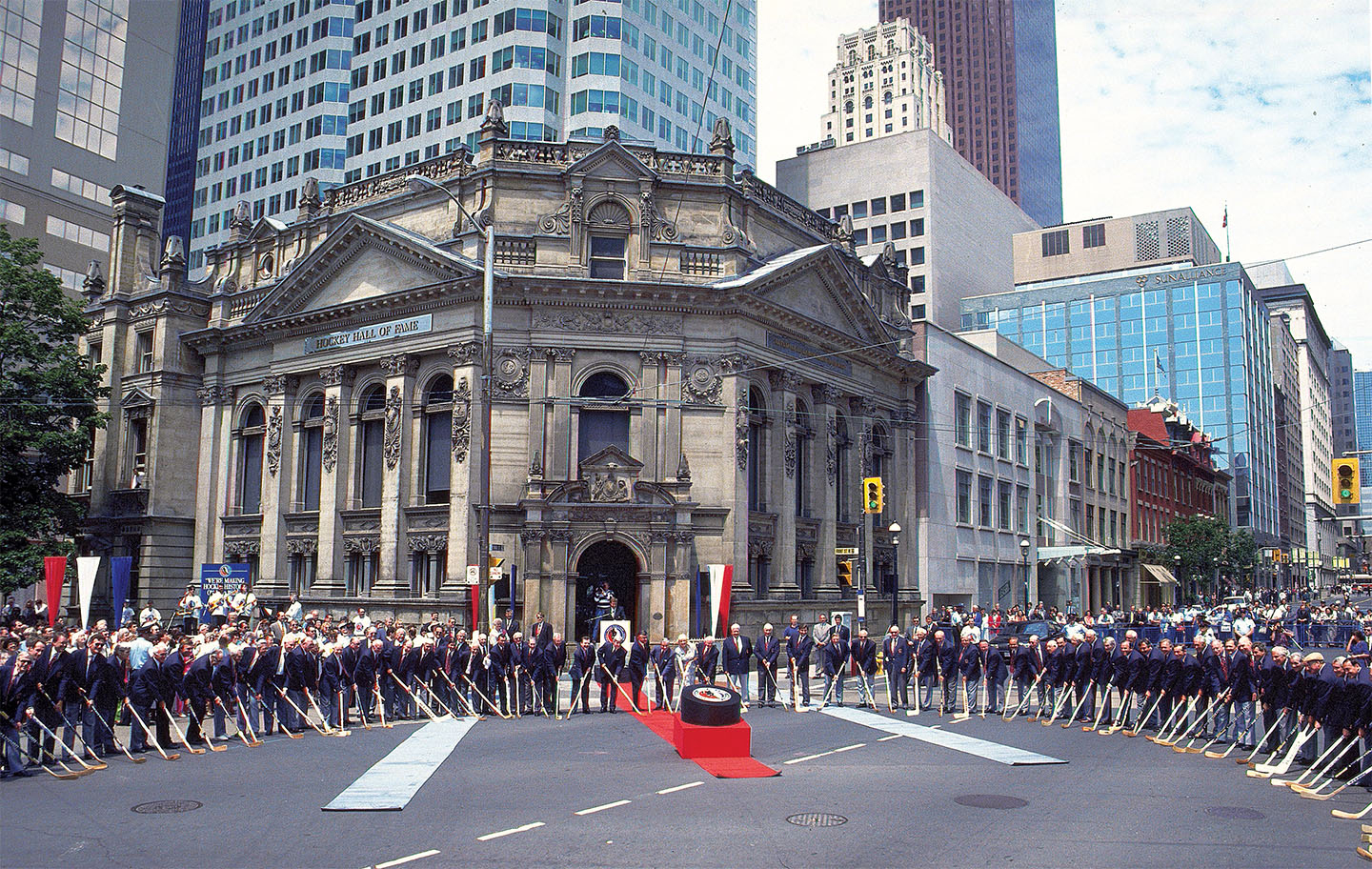 Sixty-eight Honoured Members participated in the ‘world’s largest face-off' at the corner of Yonge & Front as part of Hockey Hall of Fame’s opening festivities celebrating their new location in downtown Toronto.
