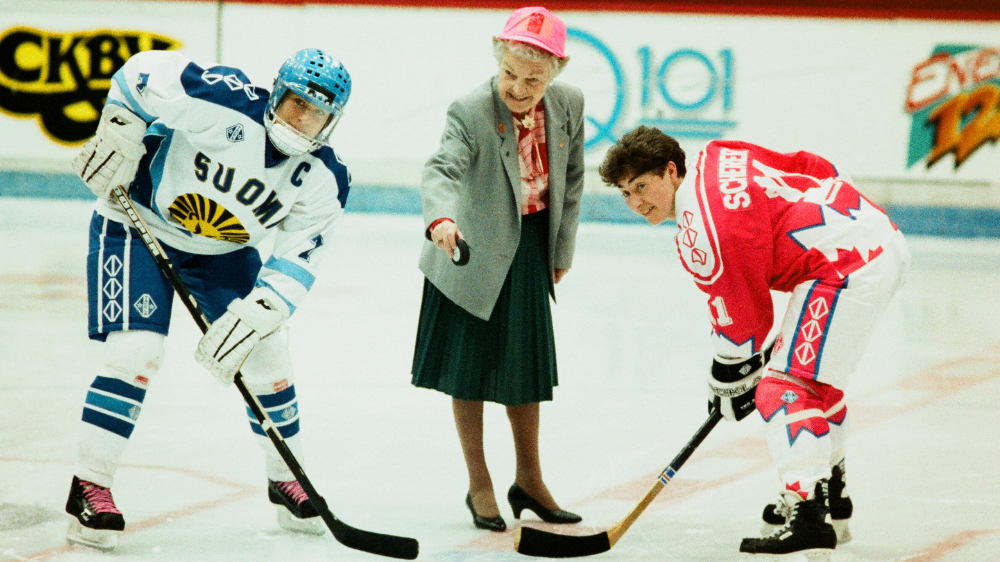 Hazel McCallion drops the puck at the first IIHF Ice Hockey Women’s World Championship in 1990. Credit: Claus Anderson